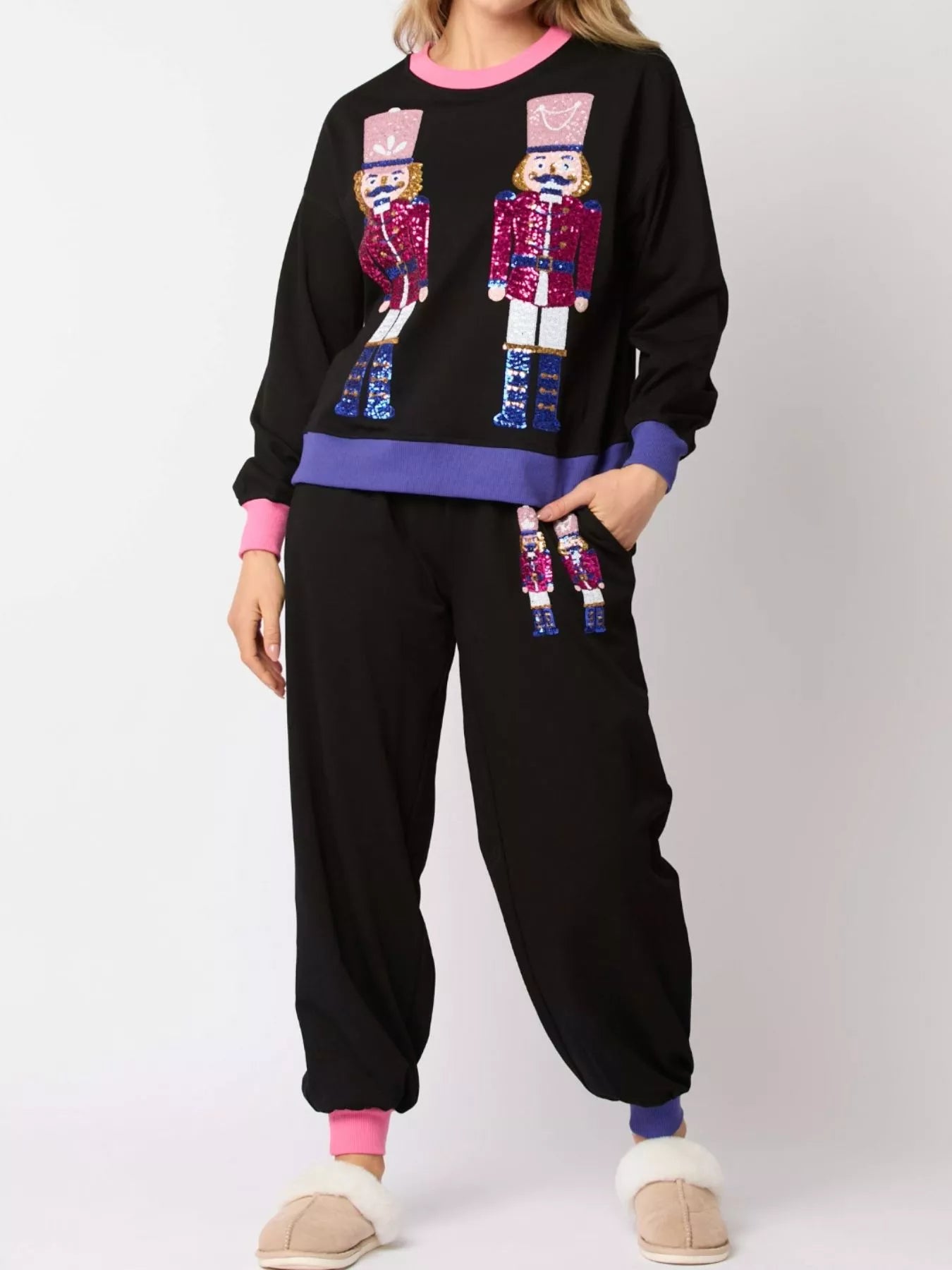 Nutcracker contrast trim sweatshirt and pants set for women, festive Christmas loungewear outfit with holiday nutcracker design, cozy matching set perfect for winter and holiday parties.